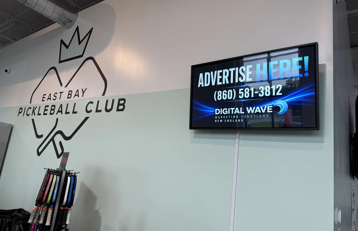 Wall-mounted Digital Wave screen at East Bay Pickleball Club in Warren, Rhode Island