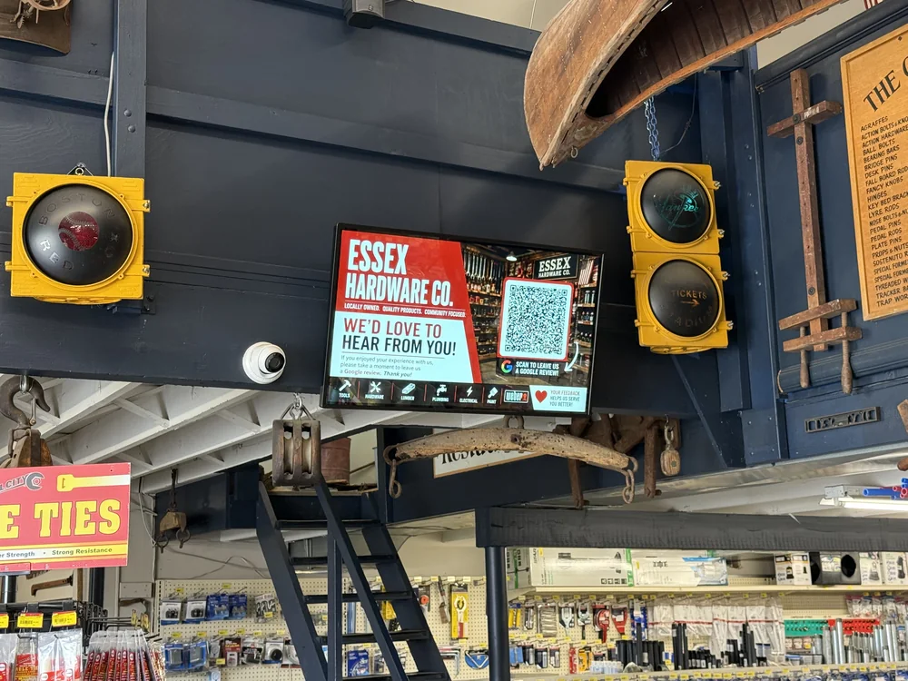 Wall-mounted screen at Essex Hardware Co. in Centerbrook, Connecticut